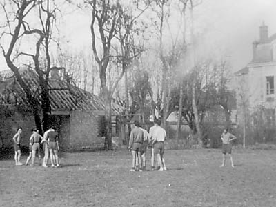 French boys practice rugby at school